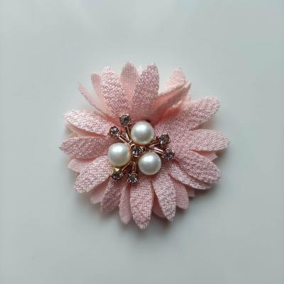 Fleur tissu trio de perle et strass 50mm peche