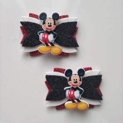 MICK001 Lot de 2 barrettes crocodile noeuds rouge, noir et blanc mickey