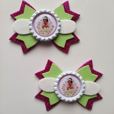 TIA001 Lot de 2 barrettes crocodile noeuds  rose fuchsia , vert et blanc  tiana princesse et la grenouille