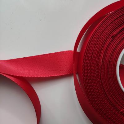 un mètre de ruban polyester rouge   25mm