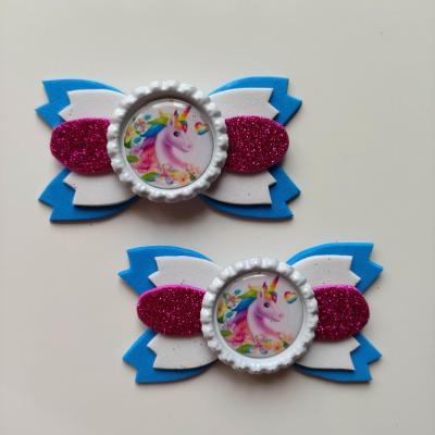 LIC002 Lot de 2 barrettes crocodile noeuds  bleu , blanc et rose fuchsia licorne