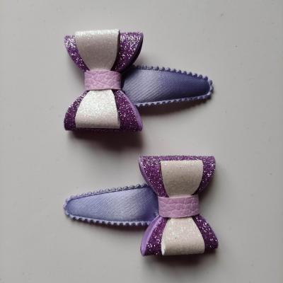 lot de 2 barrettes clic clac  noeuds mauve et blanc  B126