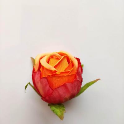 fleur tête de rose en tissu 50mm orange