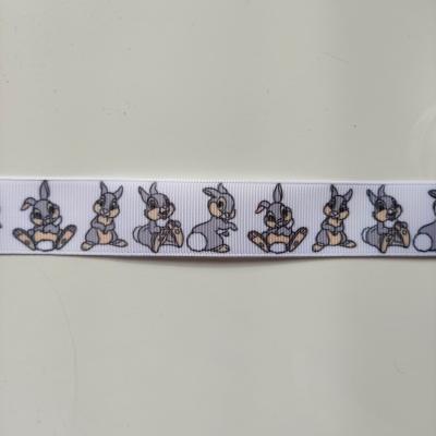 morceau de 0,55 mètre de ruban gros grain blanc motif lapin panpan gris 25mm