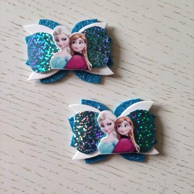 RDN003 Lot de 2 barrettes crocodile noeuds blanc et bleu turquoise anna et elsa reine des neiges