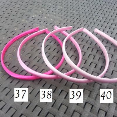 N37 Serre tête recouvert de satin 10mm rose fuchsia