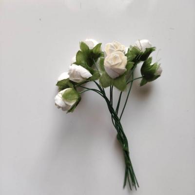 10 petites fleurs  en papier ivoire sur tige 20mm