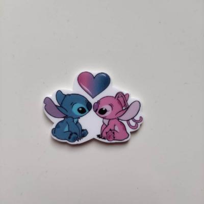 4425980 cabochon plat en resine stitch bleu et rose 40 30mm 1