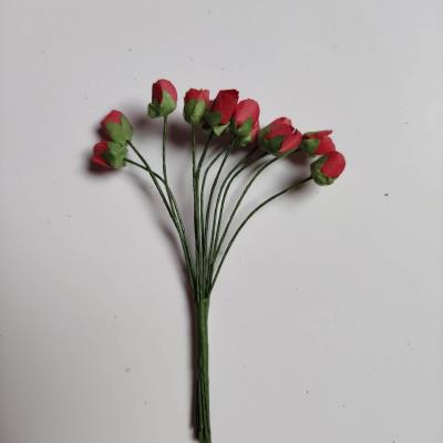 12 petites rose rouge  en papier  sur tige 10mm